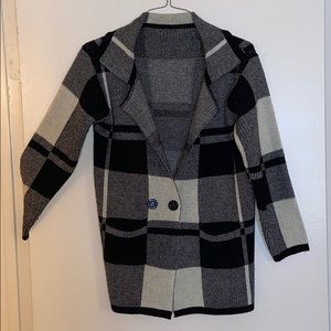 Warm, double button, pocketed over coat